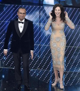 Italian host Carlo Conti and Italian actress Virginia Raffaele on stage during the Sanremo Italian Song Festival at the Ariston theater in Sanremo, Italy, 09 February 2016. The 66th Festival della Canzone Italiana runs from 09 to 13 February. ANSA/CLAUDIO ONORATI